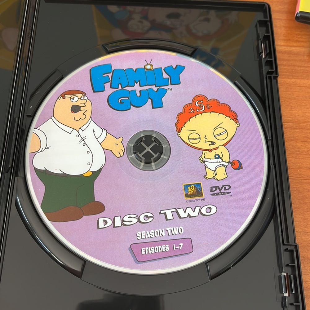 Family Guy DVDs, volume one, seasons 1 & 2, four DVDs, opened but barely… - Picture 9 of 15
